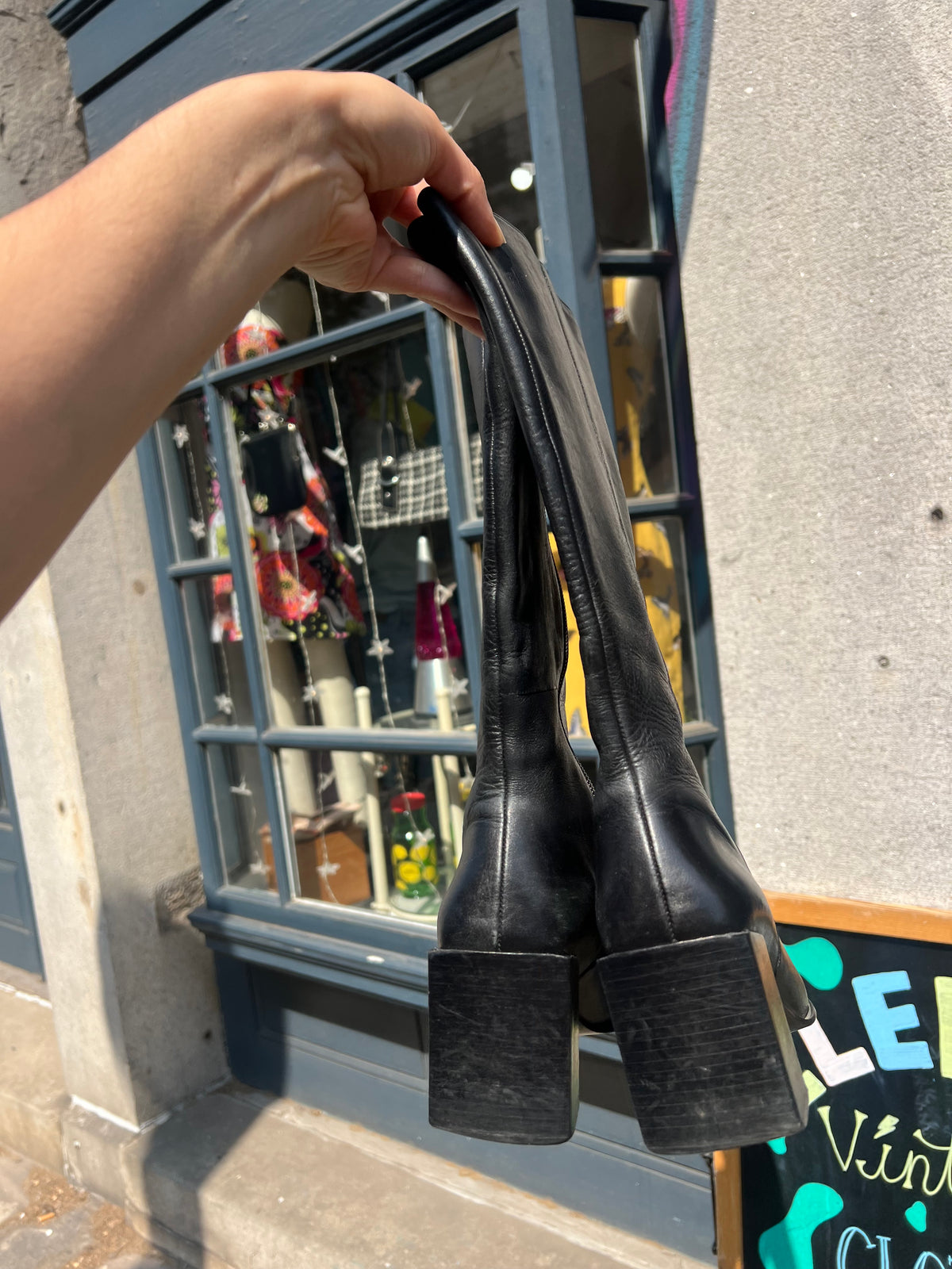 Vintage black leather mid-calf boots by Elektra Vintage, size 6, with rounded toes and sturdy block heels.