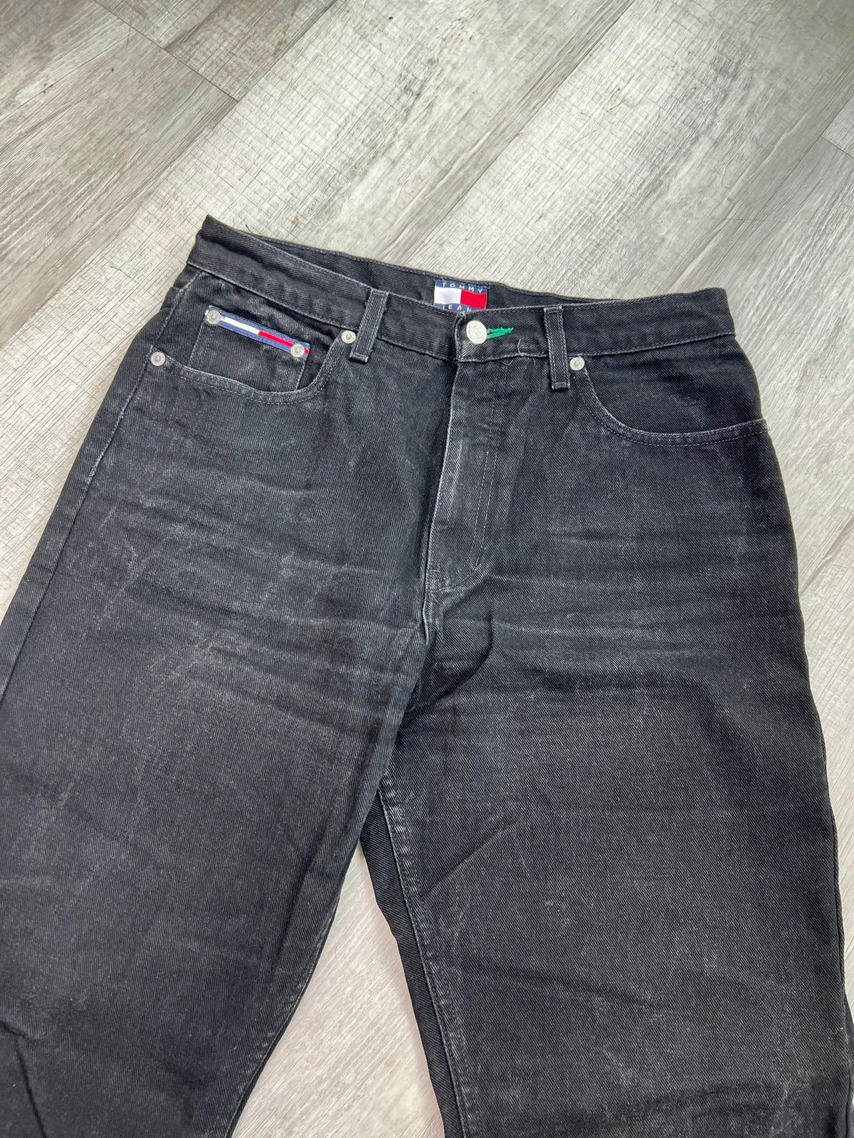 Relaxed fit black wash men's jeans by Tommy Hilfiger, styled with a casual look, from Elektra Vintage.