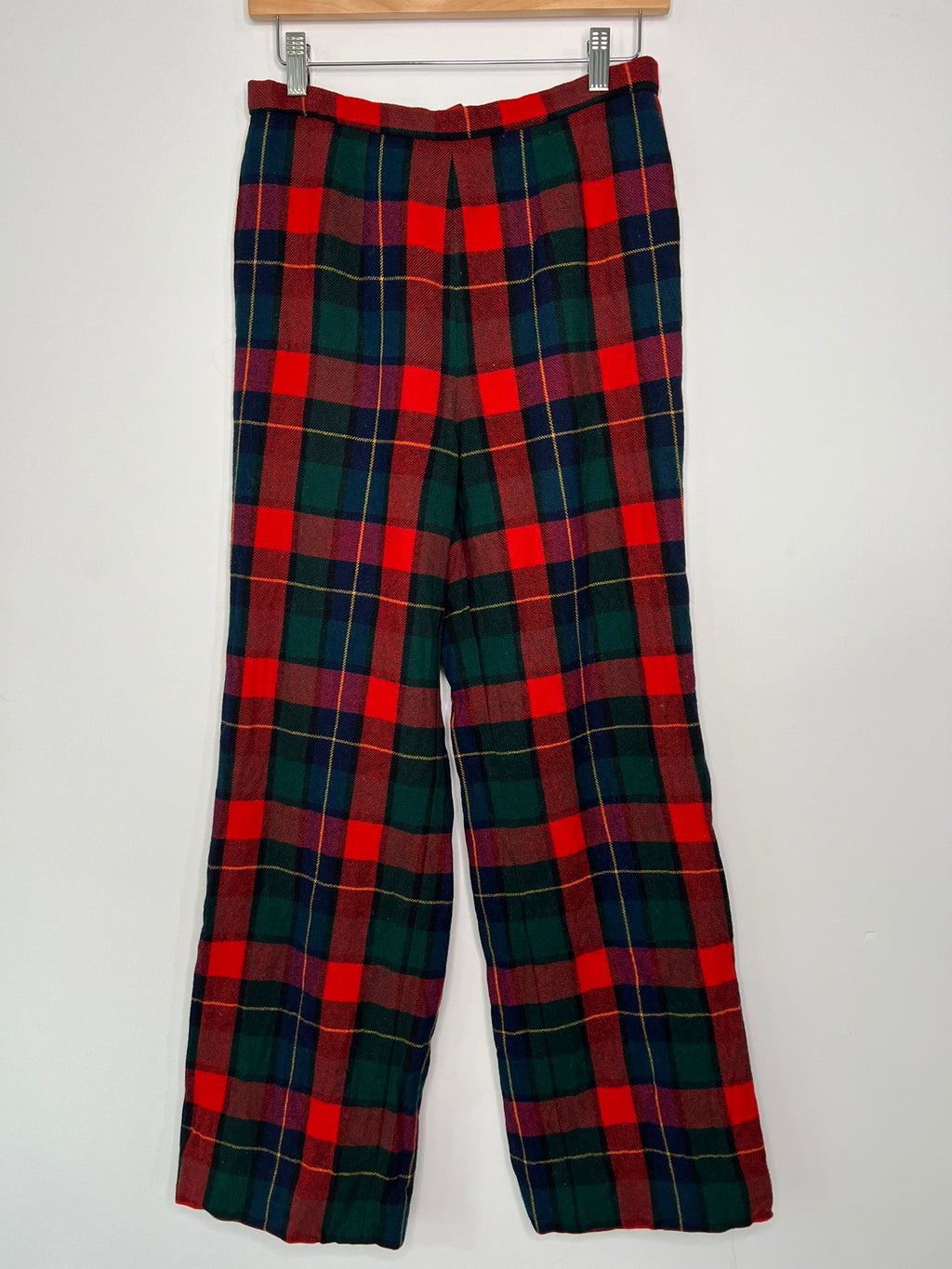 Elektra Vintage women's wool plaid pants featuring a classic vintage Pendleton design in red, green, and navy colors.