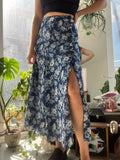 Elektra Vintage blue floral midi skirt with vintage-inspired design, flowing fabric, and elegant mid-length style.