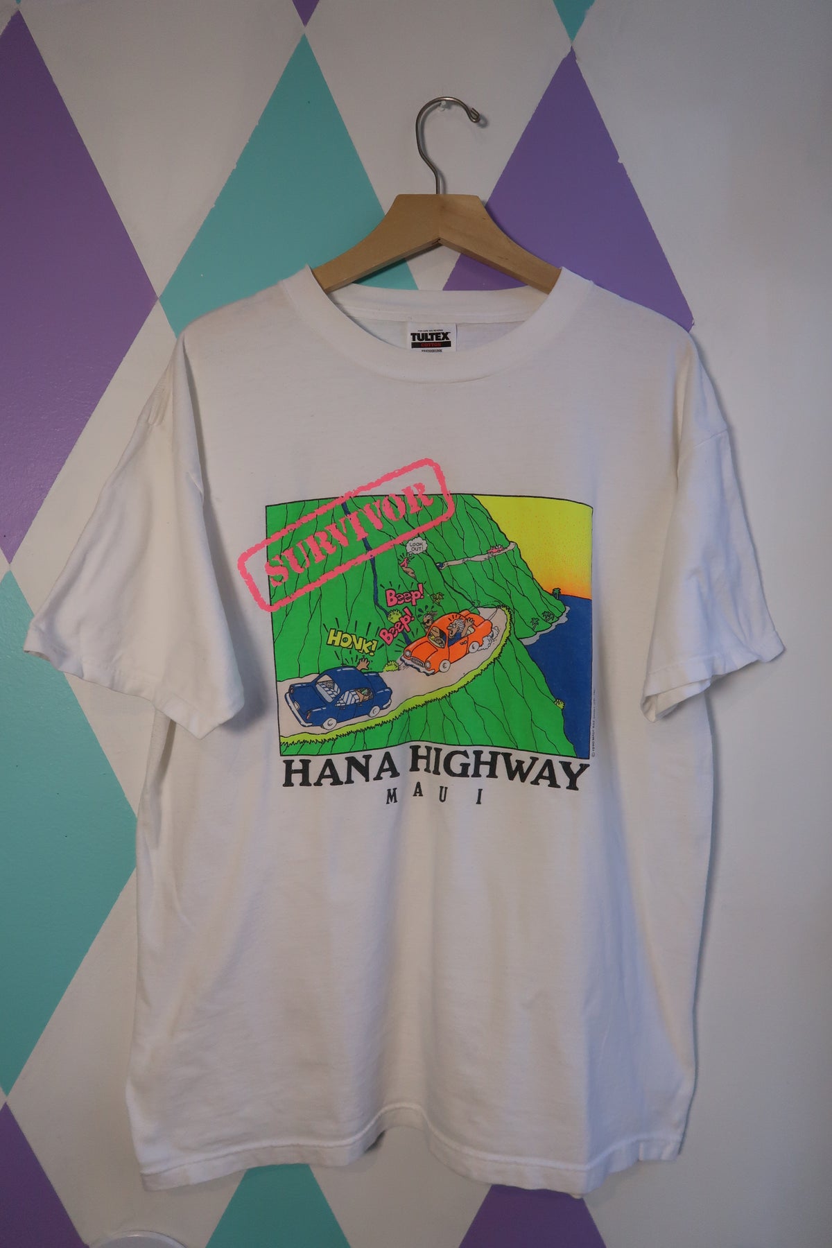 Vintage Hanna Highway Neon Graphic Tee by Elektra Vintage, featuring a vibrant highway neon print on a casual t-shirt.