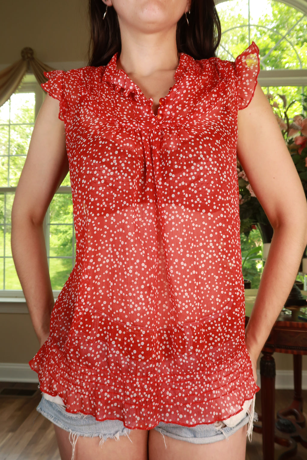 Elektra Vintage women's sleeveless blouse with red polka dots, ruffle details, and a vintage Y2K-inspired style.