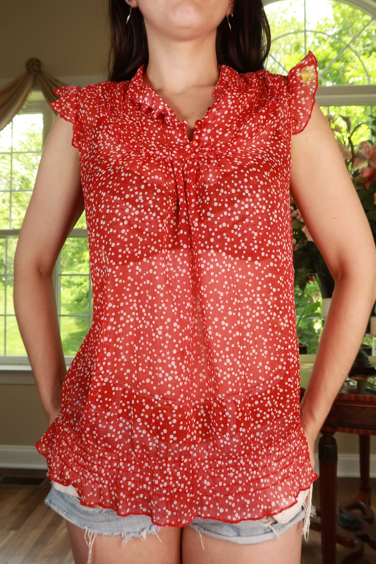Elektra Vintage women's sleeveless blouse with red polka dots, ruffle details, and a vintage Y2K-inspired style.