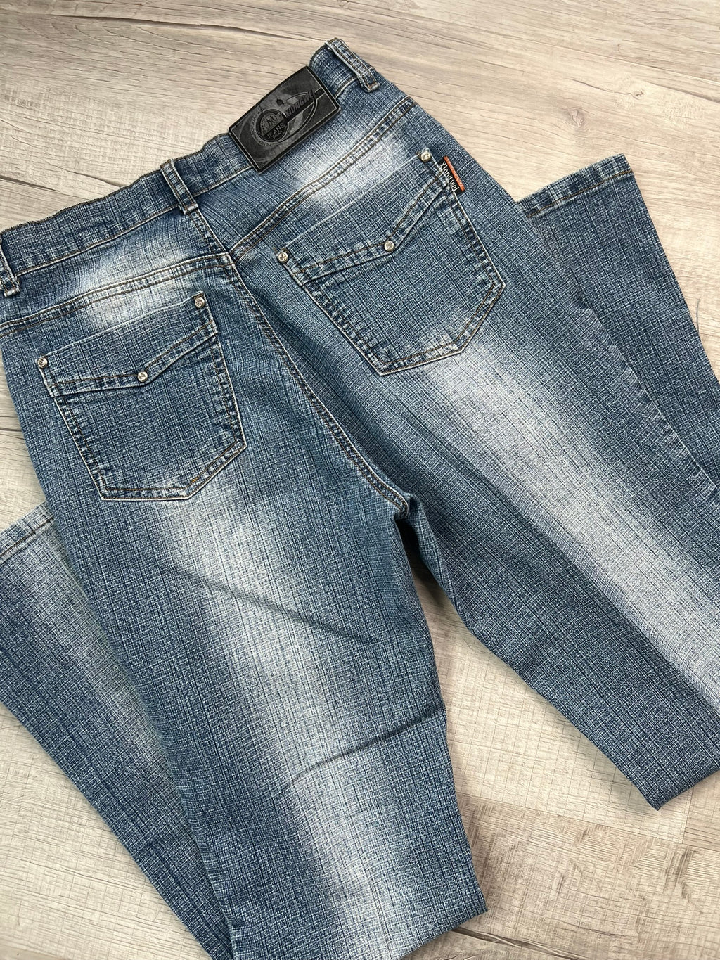Light wash vintage low rise denim jeans for women by Elektra Vintage, showcasing classic 2000s style and fit.