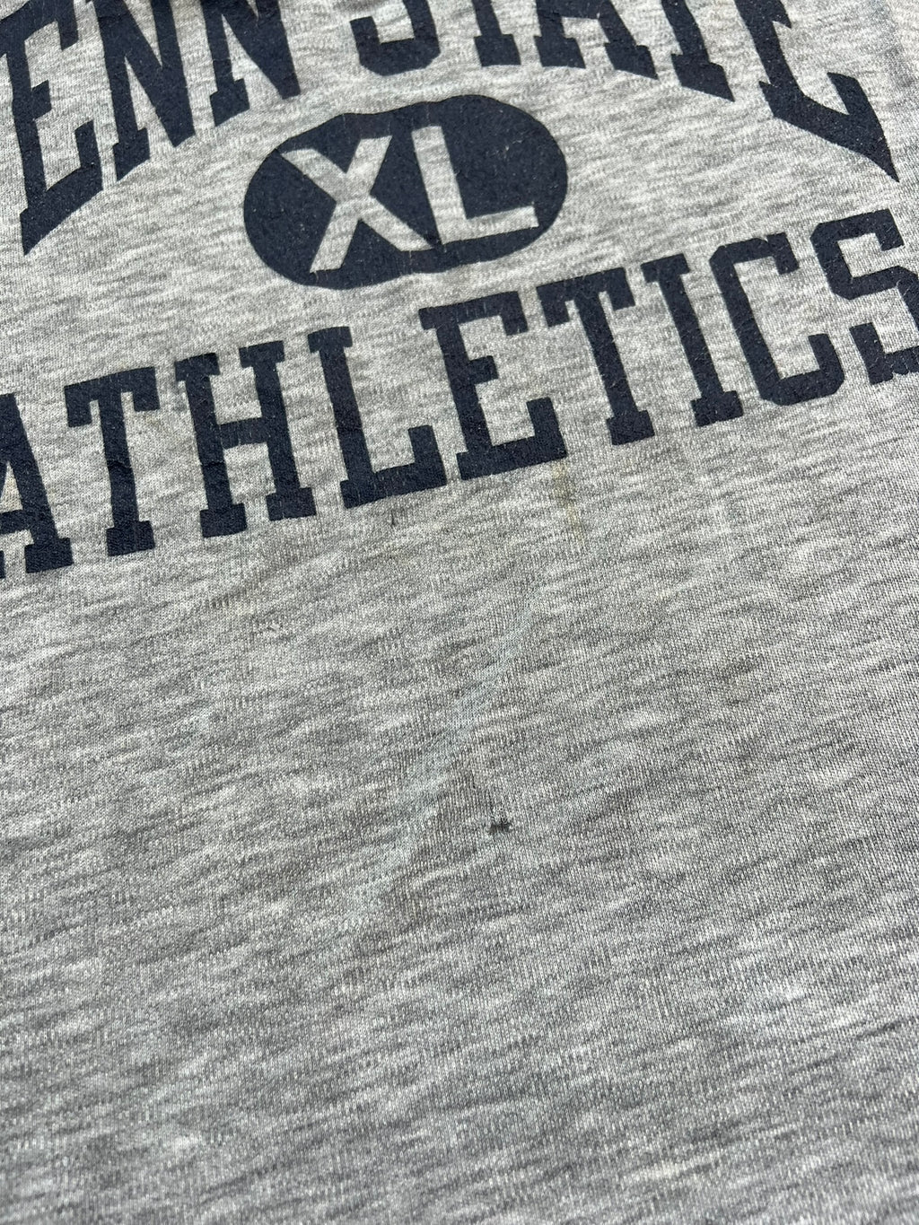 Vintage Penn State Athletics tank top by Elektra Vintage featuring classic team logo and athletic design, displayed on a plain background.