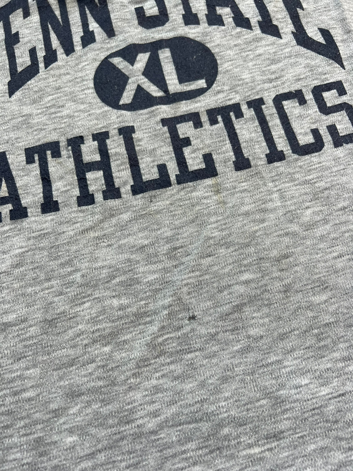 Vintage Penn State Athletics tank top by Elektra Vintage featuring classic team logo and athletic design, displayed on a plain background.