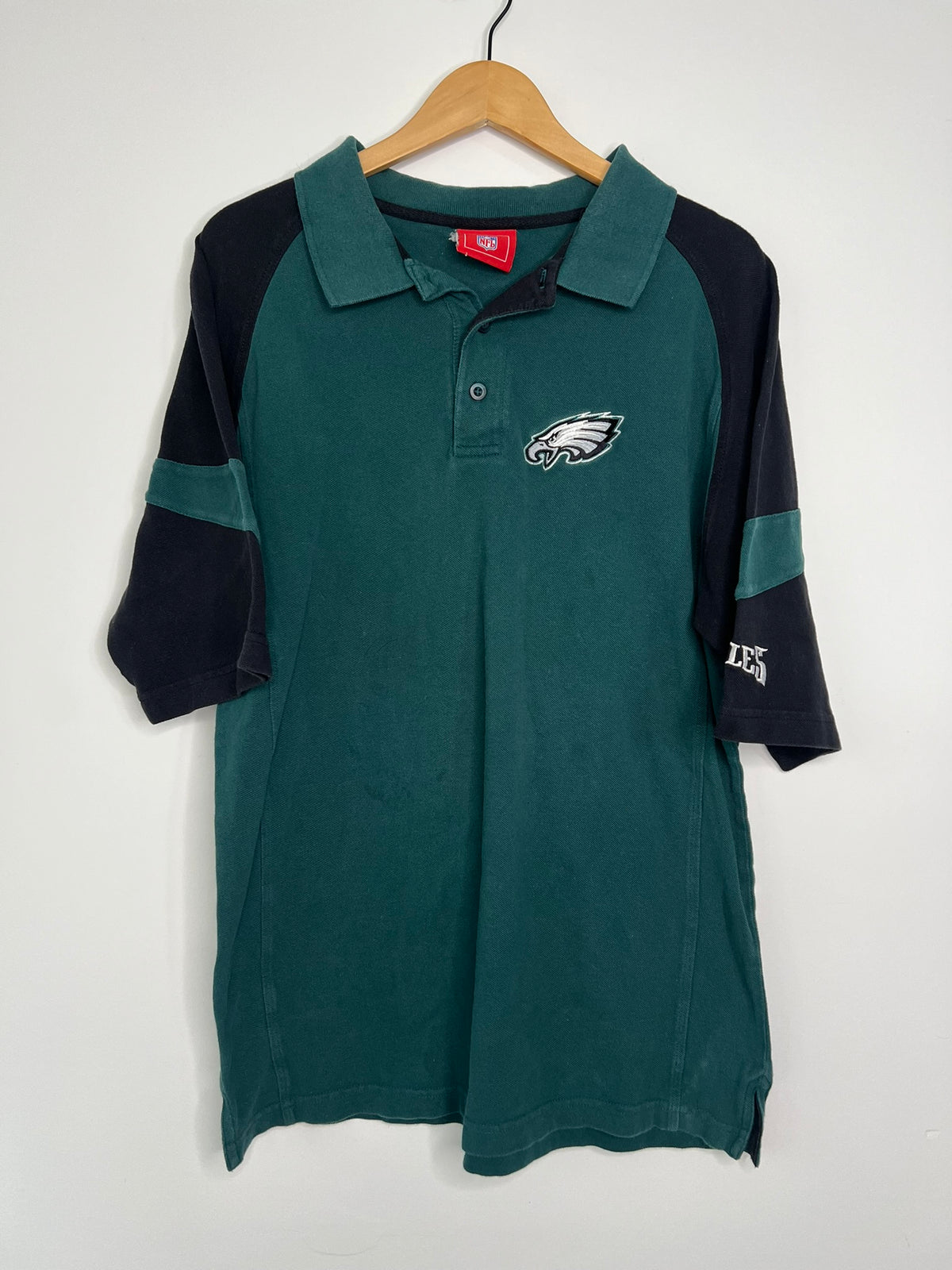 2000s vintage Eagles polo shirt by Elektra Vintage, featuring classic design and embroidered eagle logo on the chest.