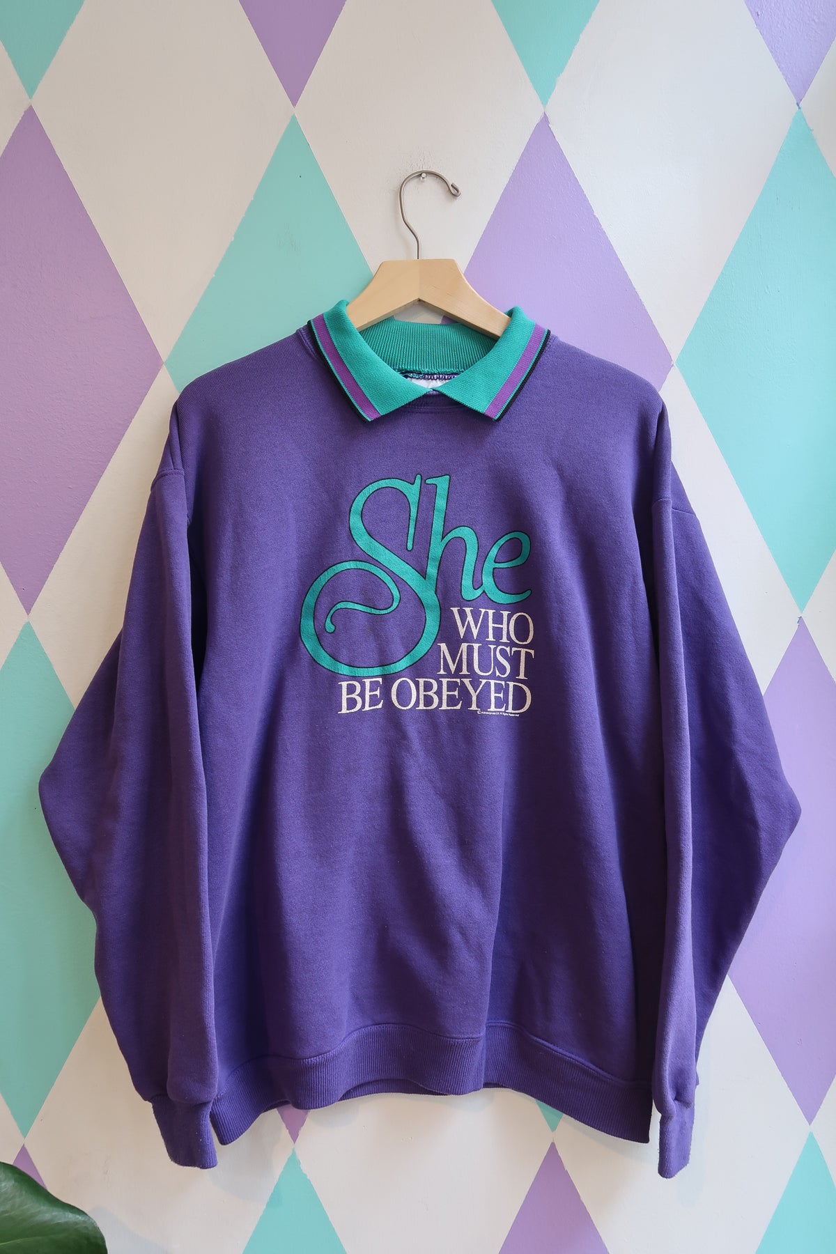 Vintage “She Who Must Be Obeyed” Graphic Sweatshirt – Purple with Teal Collar