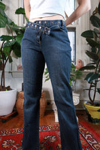 Load image into Gallery viewer, Vintage 2000s Dark Wash Low Rise Grommet Belt Flare Jeans
