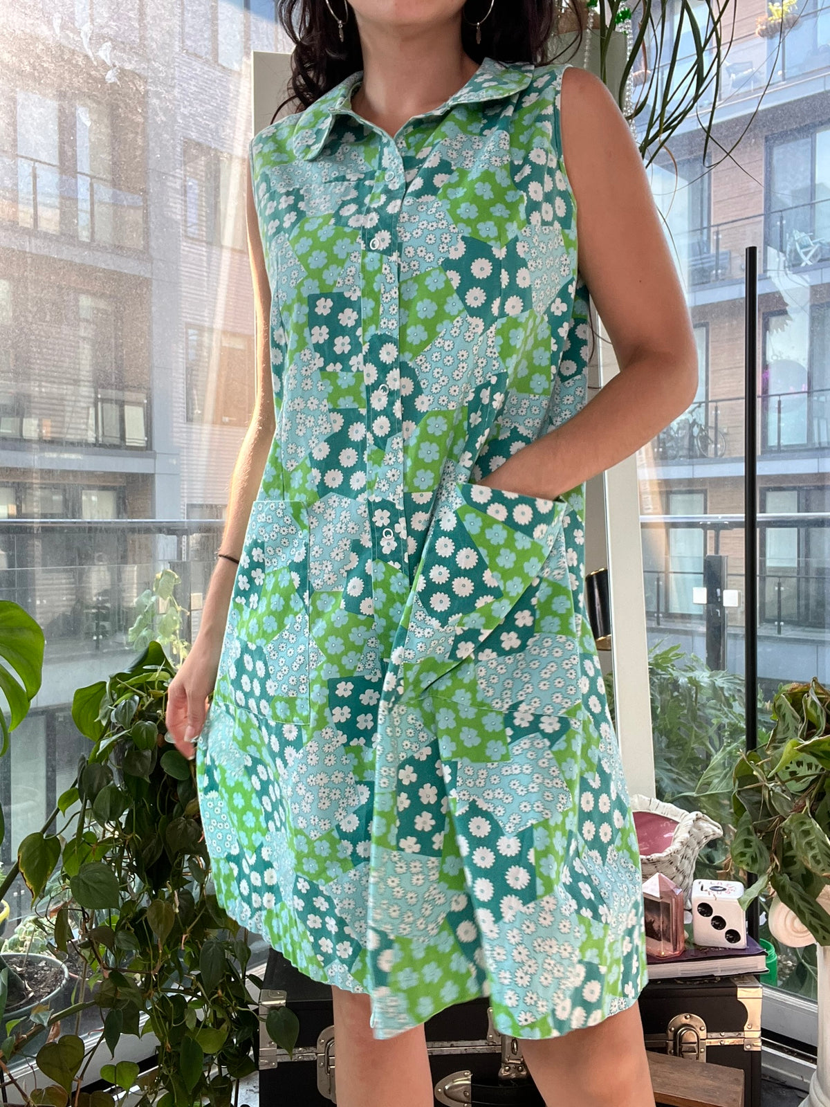 Vintage 60s mod flower patchwork house dress by Elektra Vintage, featuring colorful floral patterns and classic 1960s style.