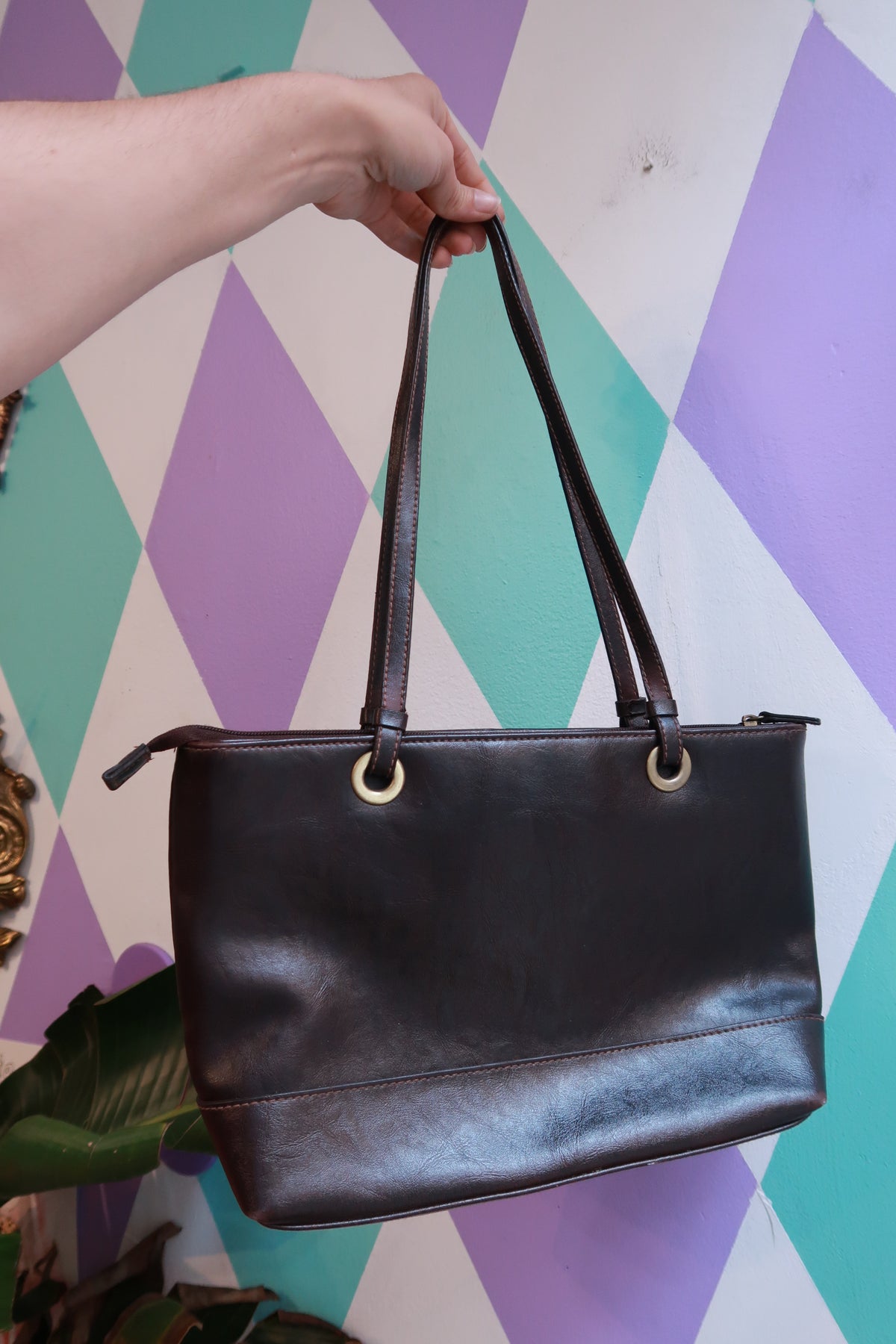 Vintage espresso brown Elektra Vintage shoulder bag with minimalist tote design, featuring sleek leather and subtle stitching.