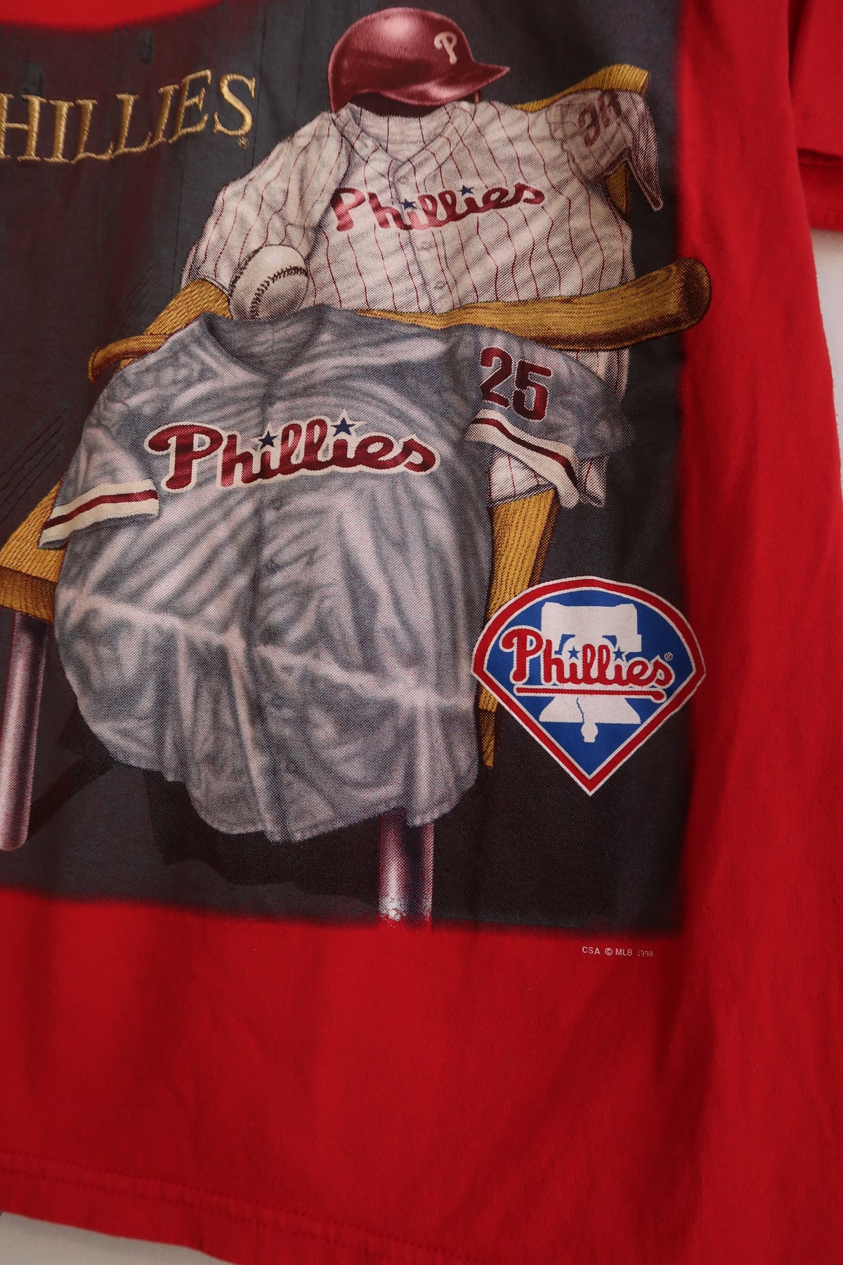 Women's vintage 1998 Philadelphia Phillies graphic tee by Elektra Vintage in red, featuring a retro baseball team design.