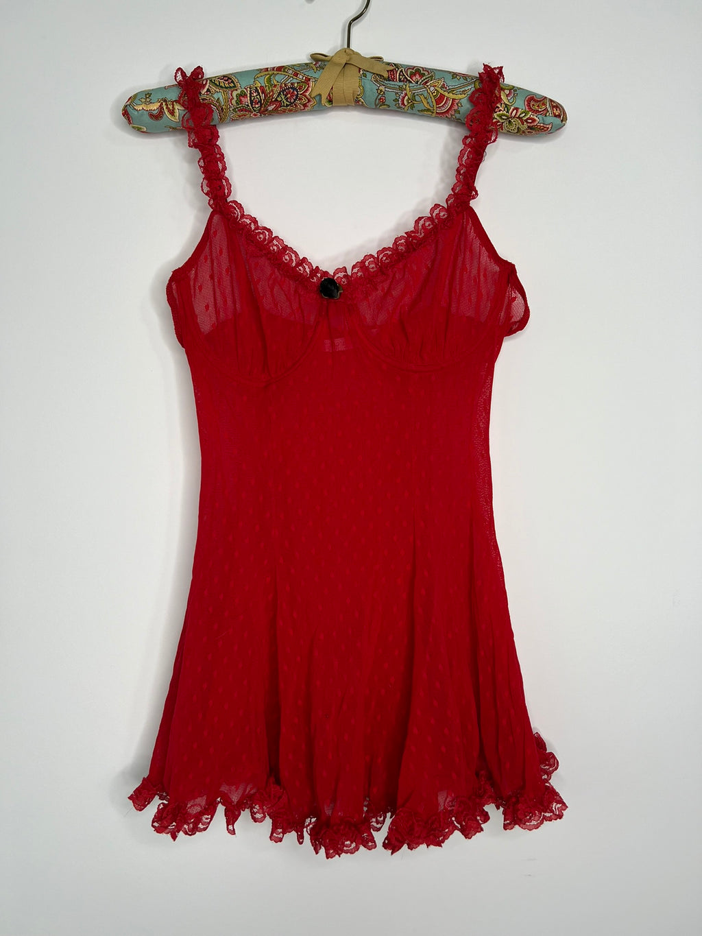 Red lace women's top from the 2000s Victoria's Secret collection, featuring intricate lace details and a fitted design.