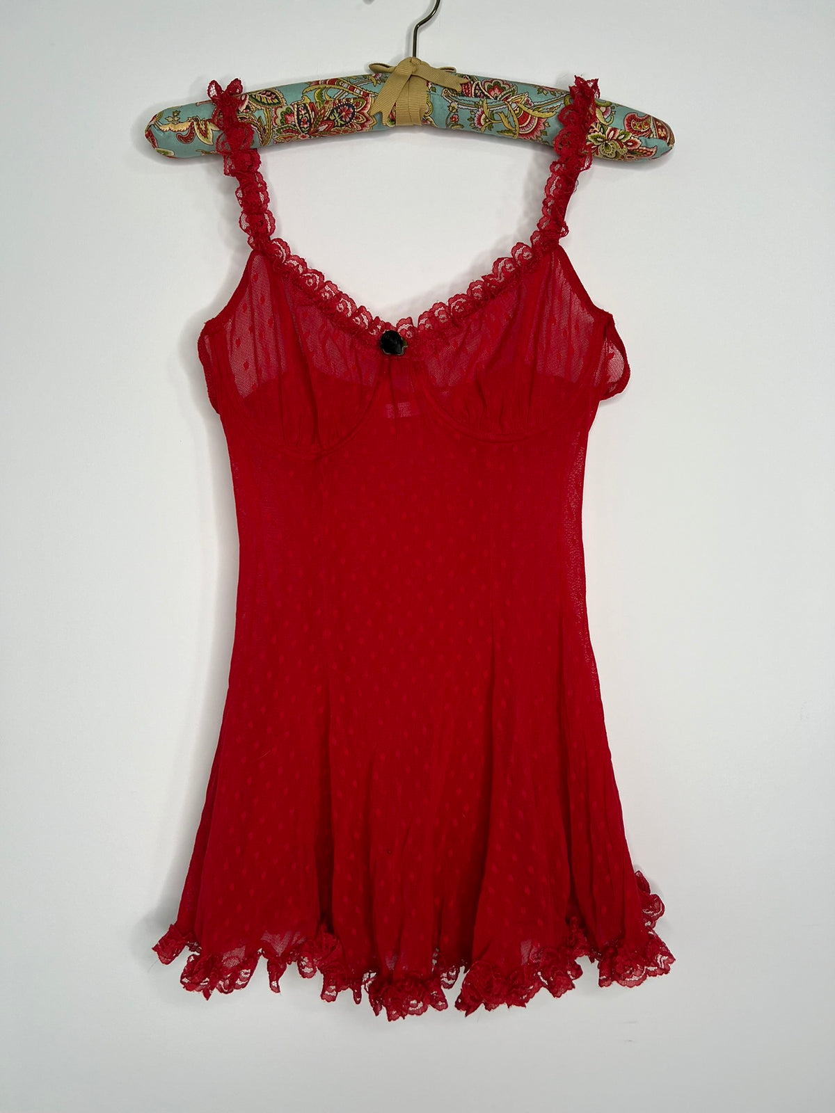Red lace women's top from the 2000s Victoria's Secret collection, featuring intricate lace details and a fitted design.
