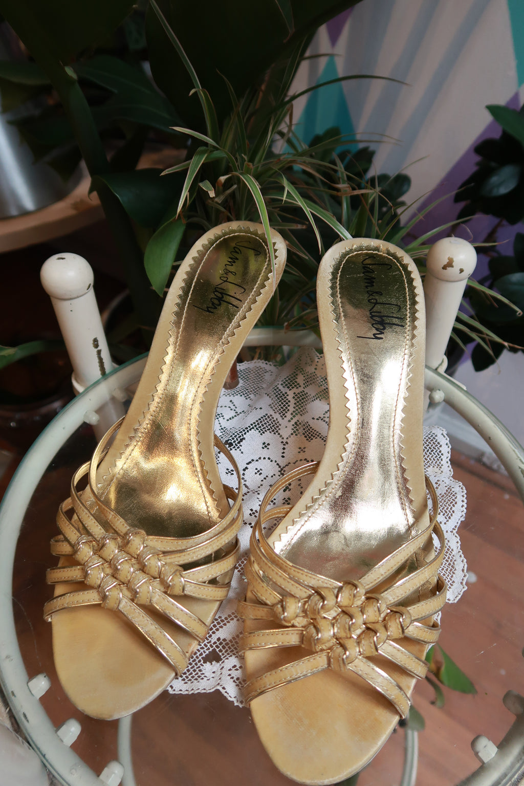 Vintage Y2K gold strappy mule heels by Elektra Vintage, showcasing shiny metallic finish and stylish open-back design.