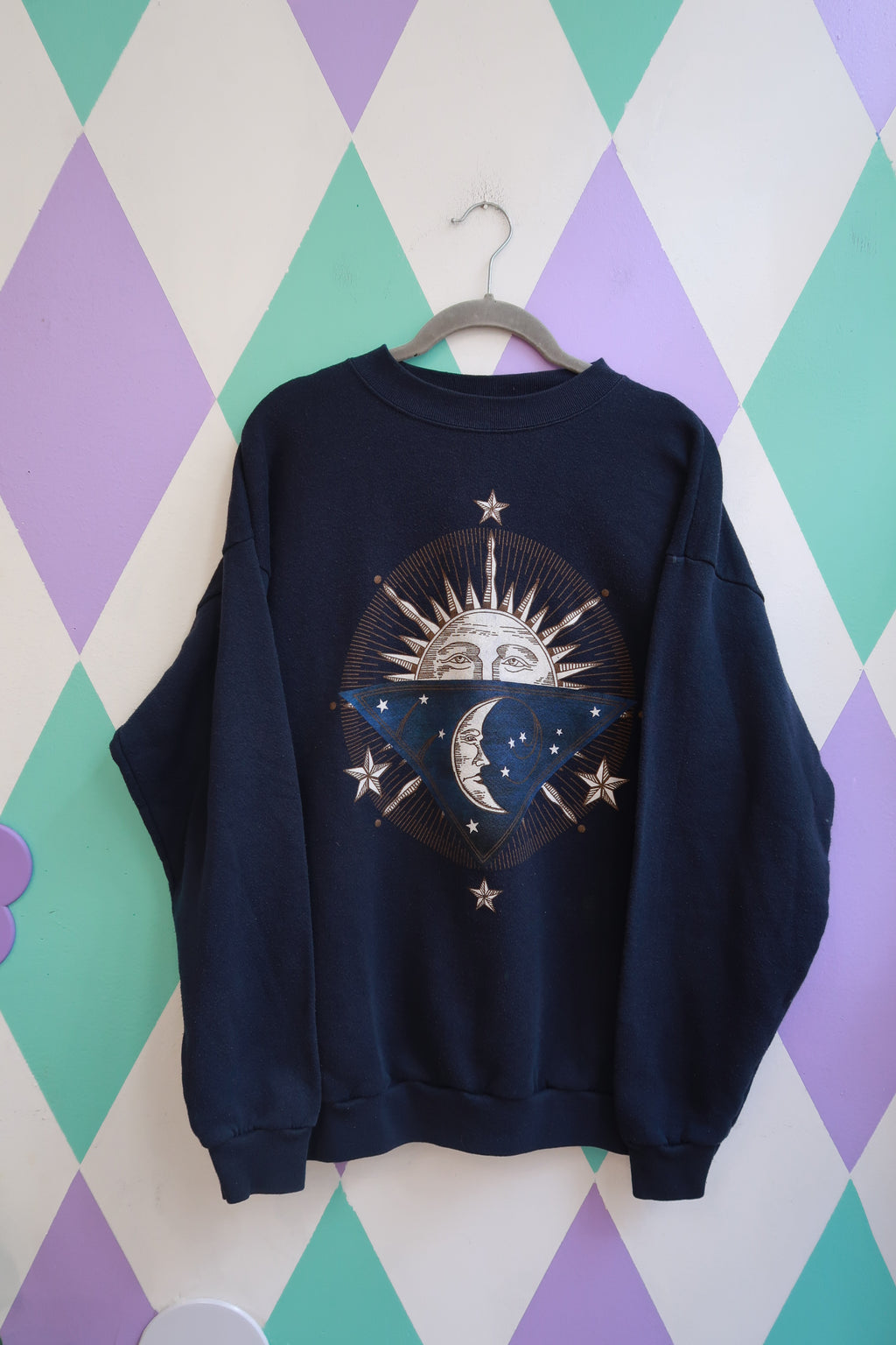 Navy blue vintage 90s Elektra Vintage celestial sun and moon graphic crewneck sweatshirt, cozy and retro-inspired.