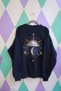 Navy blue vintage 90s Elektra Vintage celestial sun and moon graphic crewneck sweatshirt, cozy and retro-inspired.