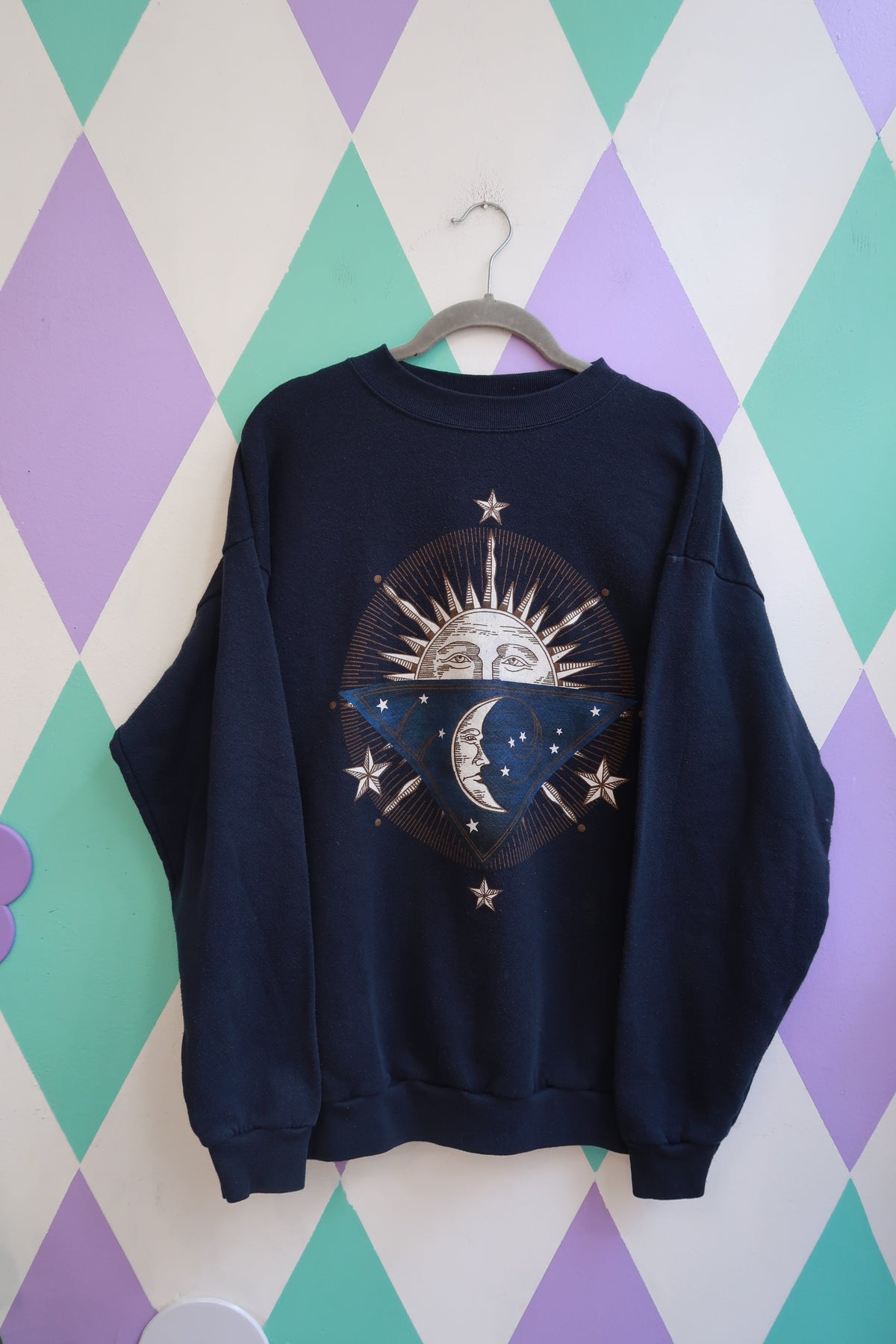 Navy blue vintage 90s Elektra Vintage celestial sun and moon graphic crewneck sweatshirt, cozy and retro-inspired.