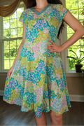 Vintage cotton floral patchwork midi dress by Elektra Vintage, featuring a classic design with colorful floral patterns.