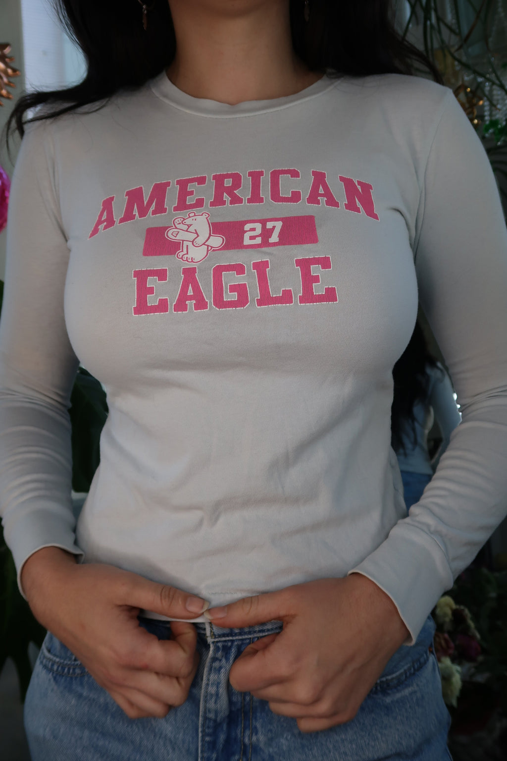 Light blue American Eagle women's long sleeve top from the 2000s, styled with casual fit and vintage design by Elektra Vintage.