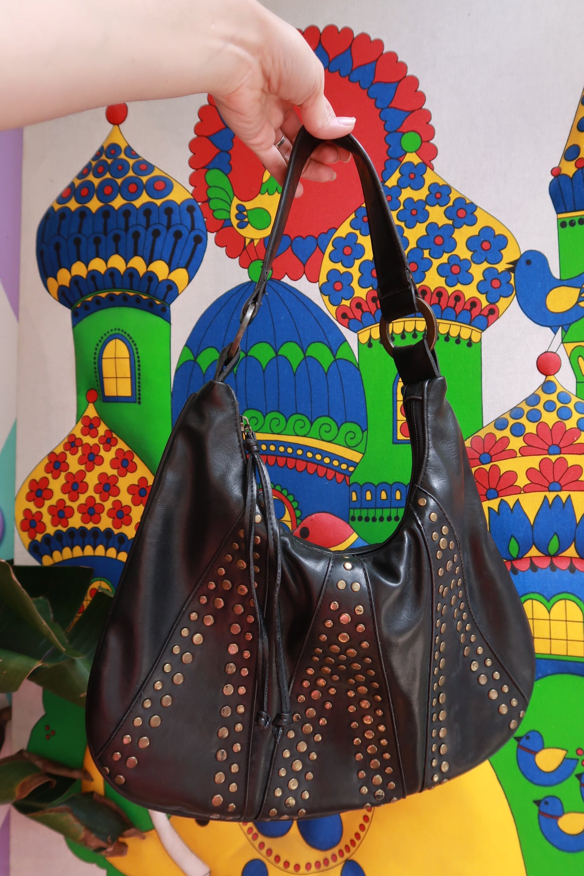Elektra Vintage vintage faux leather studded hobo shoulder bag showing textured material, metal studs, and slouchy design.