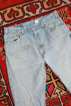Load image into Gallery viewer, Vintage Levi’s 505 Regular Fit Straight Leg Jeans Made in USA
