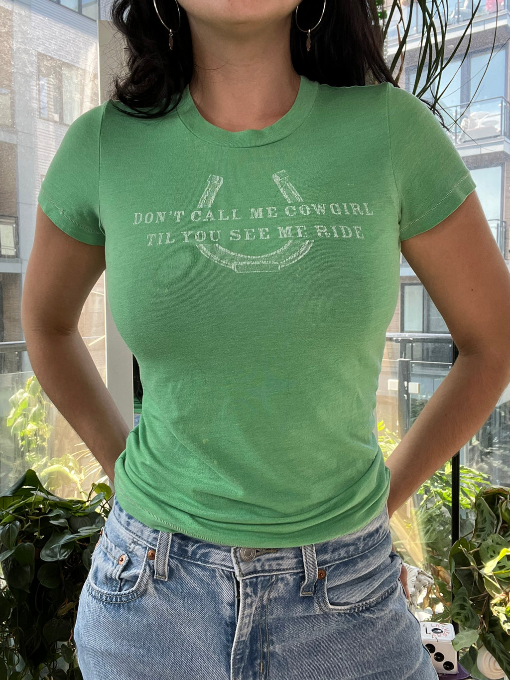 Vintage green cowgirl baby tee by Abercrombie, women's top from Elektra Vintage with a casual fit and cowgirl graphic design.