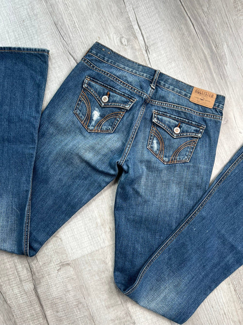 Elektra Vintage women's low rise denim jeans from the 2000s with distressed details and a relaxed fit.