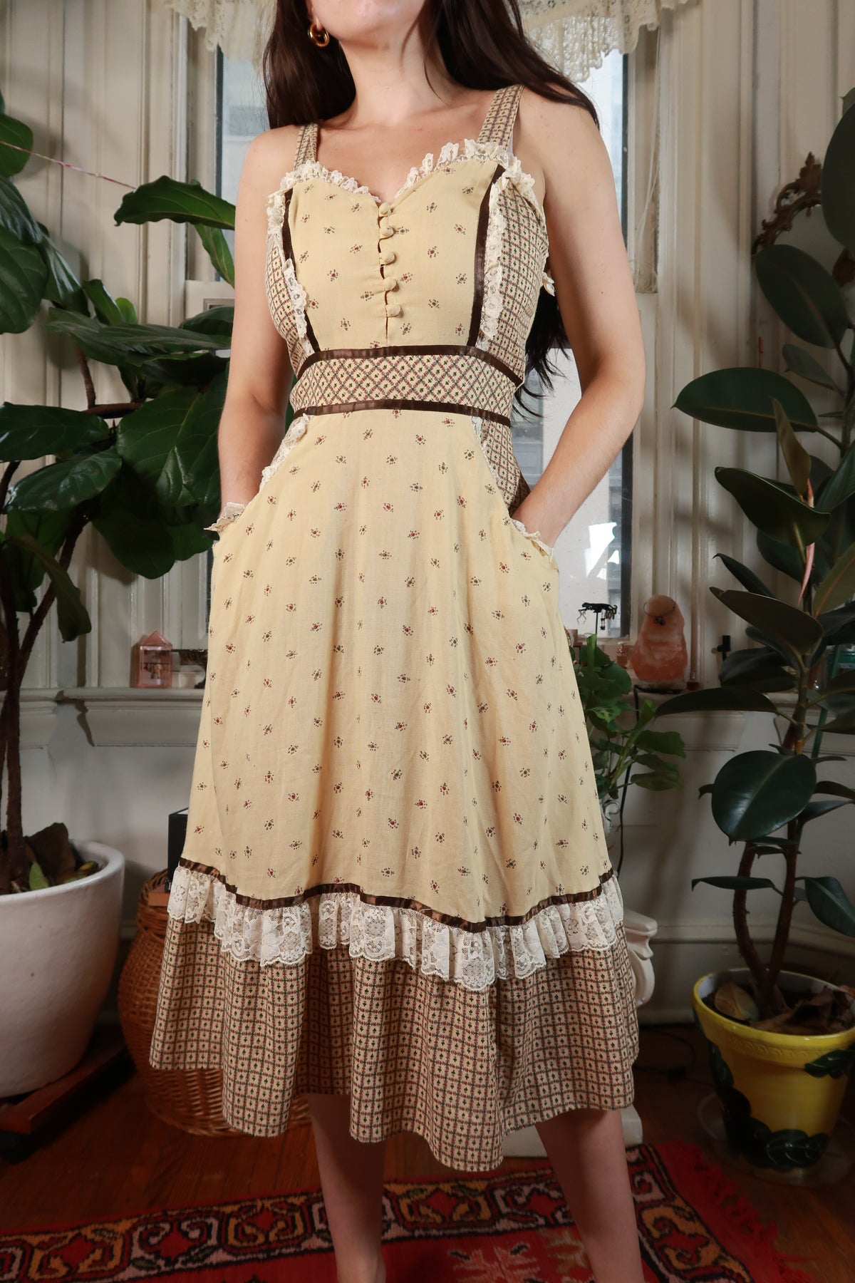 Vintage 1970s floral prairie lace trim midi dress by Elektra Vintage, featuring a feminine floral pattern and lace details.