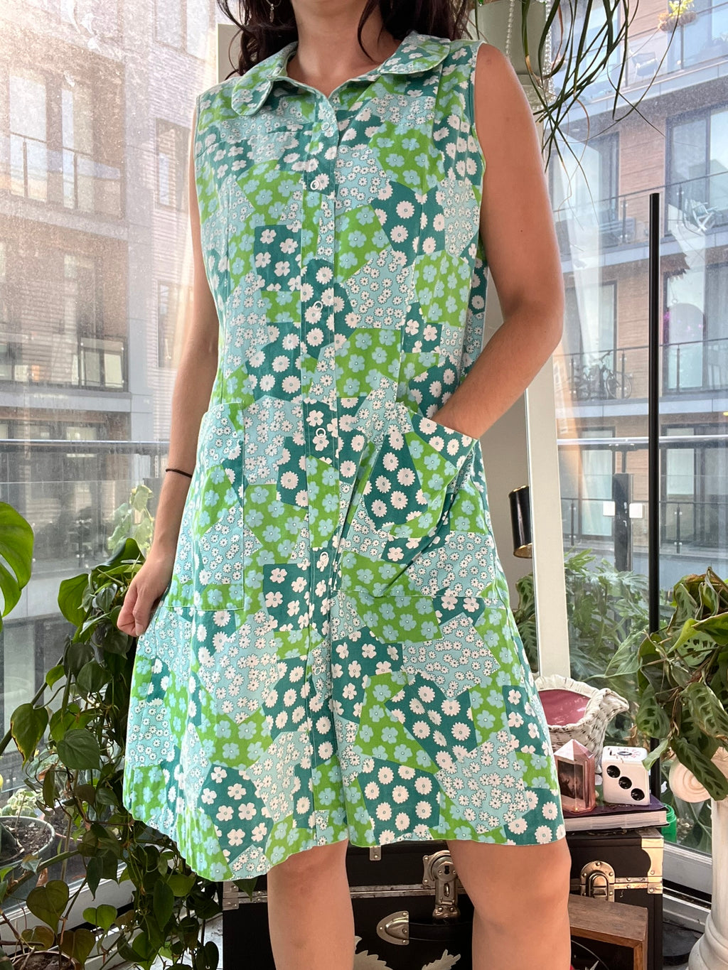 Vintage 60s mod flower patchwork house dress by Elektra Vintage, featuring colorful floral patterns and classic 1960s style.