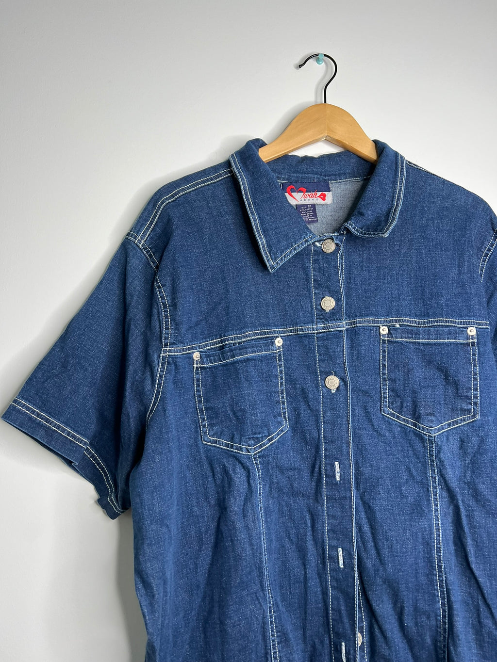 Vintage 2000s denim button-up shirt for women by Elektra Vintage, featuring classic blue denim fabric and button details.