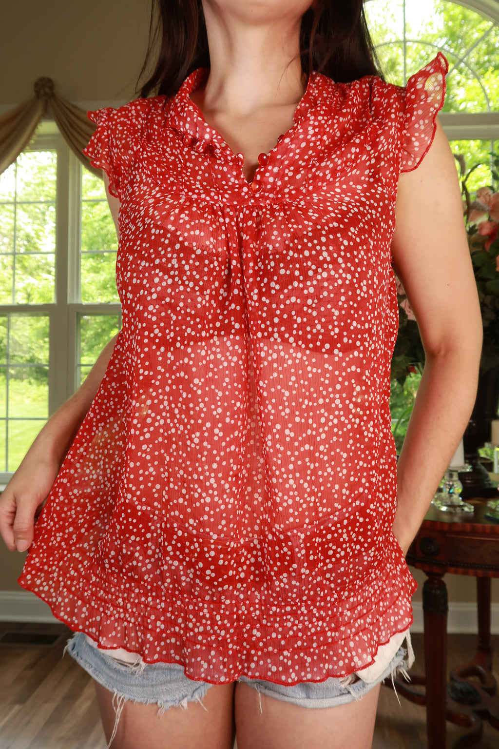 Vintage Y2K red polka dot sleeveless blouse by Elektra Vintage featuring ruffle accents, perfect for retro-inspired women's fashion.