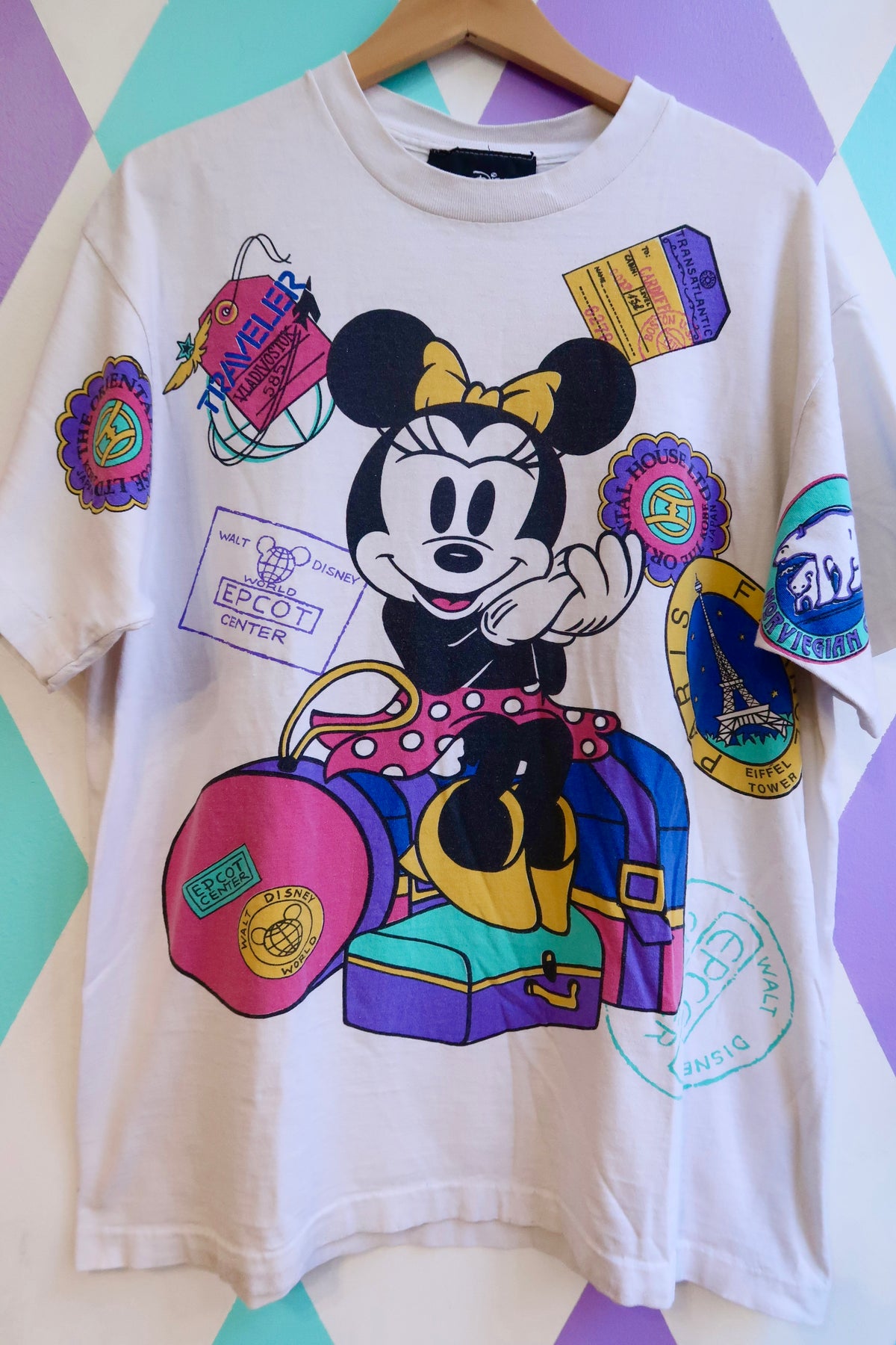 Vintage 90s Disney Minnie Mouse graphic tee with all-over print, featuring EPCOT theme, by Elektra Vintage.