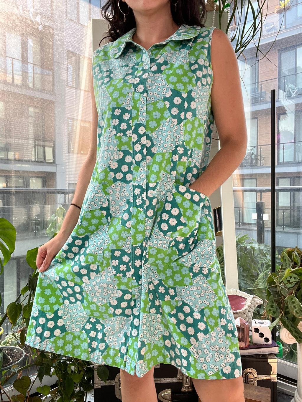 Vintage 60s mod flower patchwork house dress by Elektra Vintage, featuring a colorful floral pattern and classic house dress style.