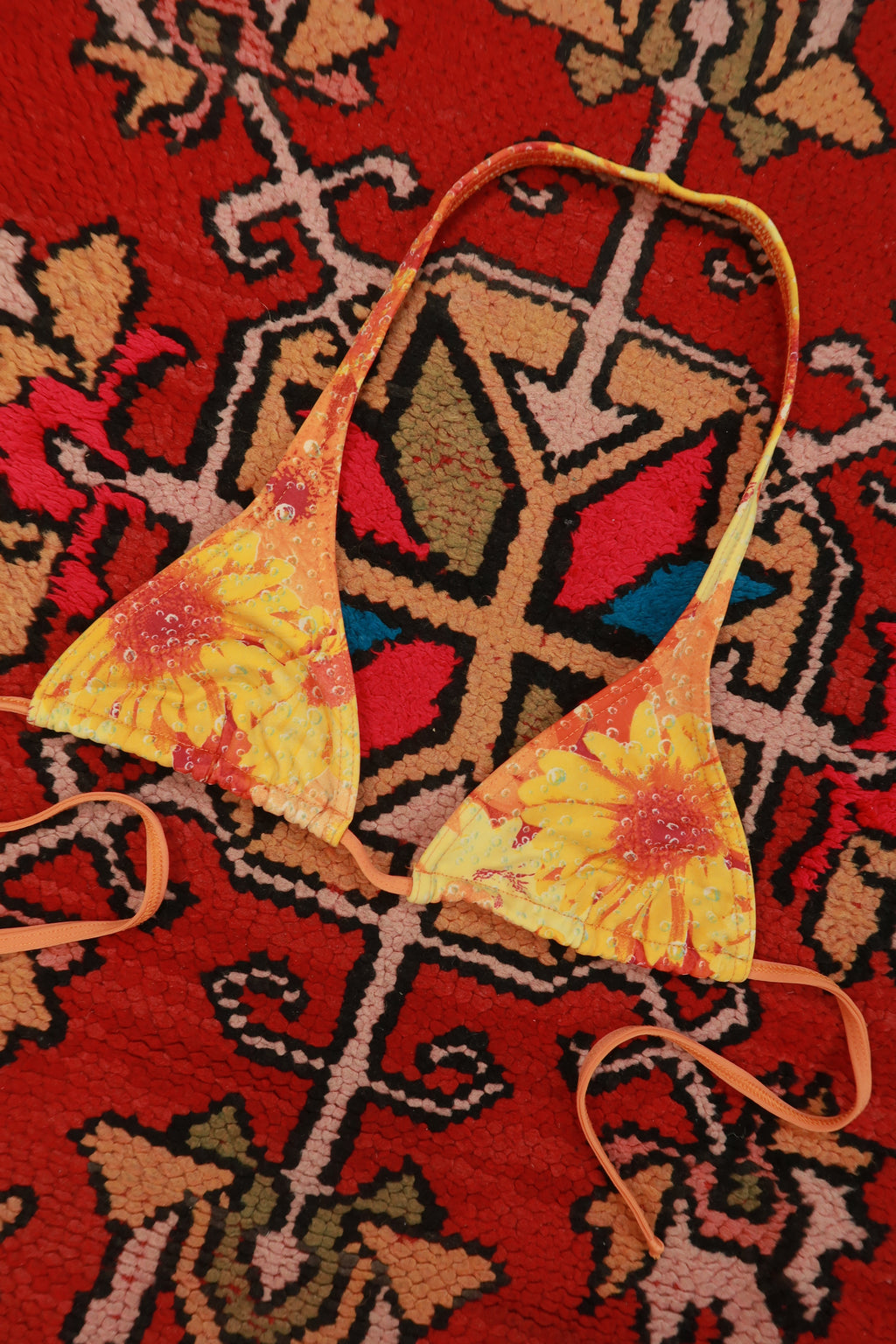 Vintage 2000s Brazilian sunflower print triangle bikini top by Elektra Vintage, featuring bright yellow sunflower patterns on lightweight fabric.