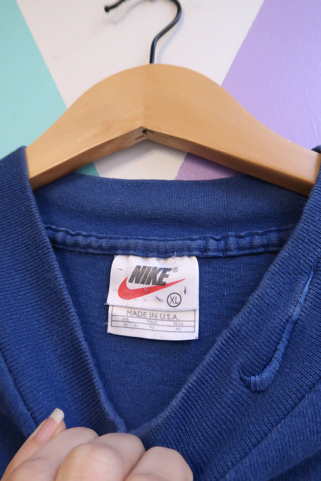 Vintage 90s Nike royal blue men's mock neck sweatshirt by Elektra Vintage, featuring a classic fit and Nike logo detail.