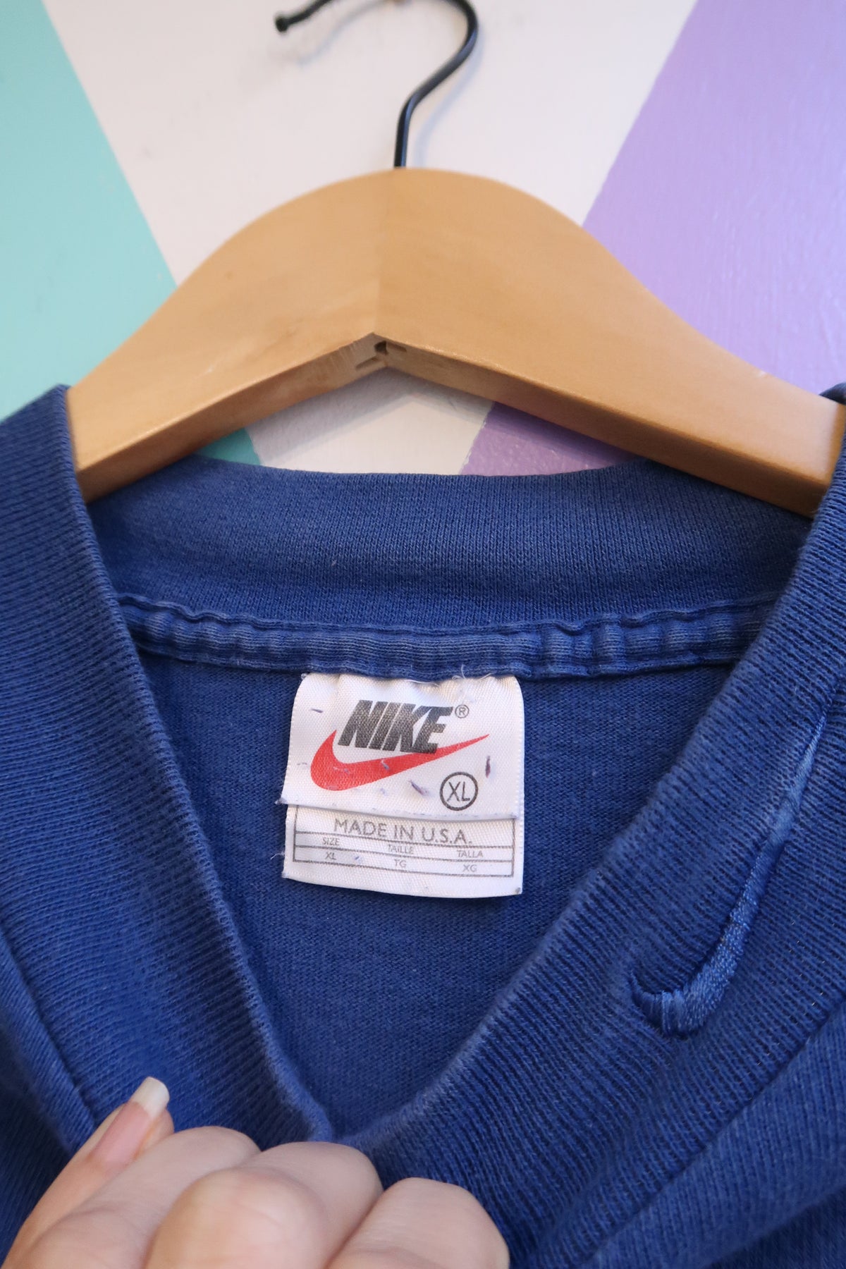 Vintage 90s Nike royal blue men's mock neck sweatshirt by Elektra Vintage, featuring a classic fit and Nike logo detail.