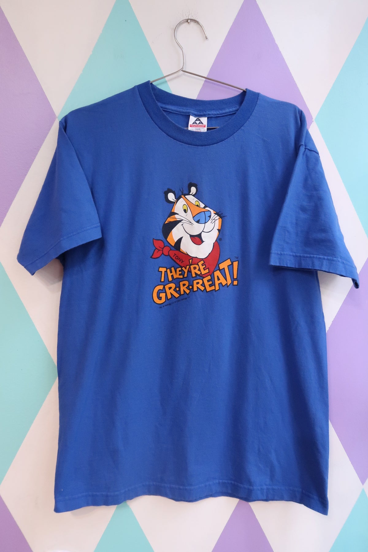 Vintage 2000s Tony the Tiger graphic men's T-shirt by Elektra Vintage, featuring bold tiger design on soft fabric.