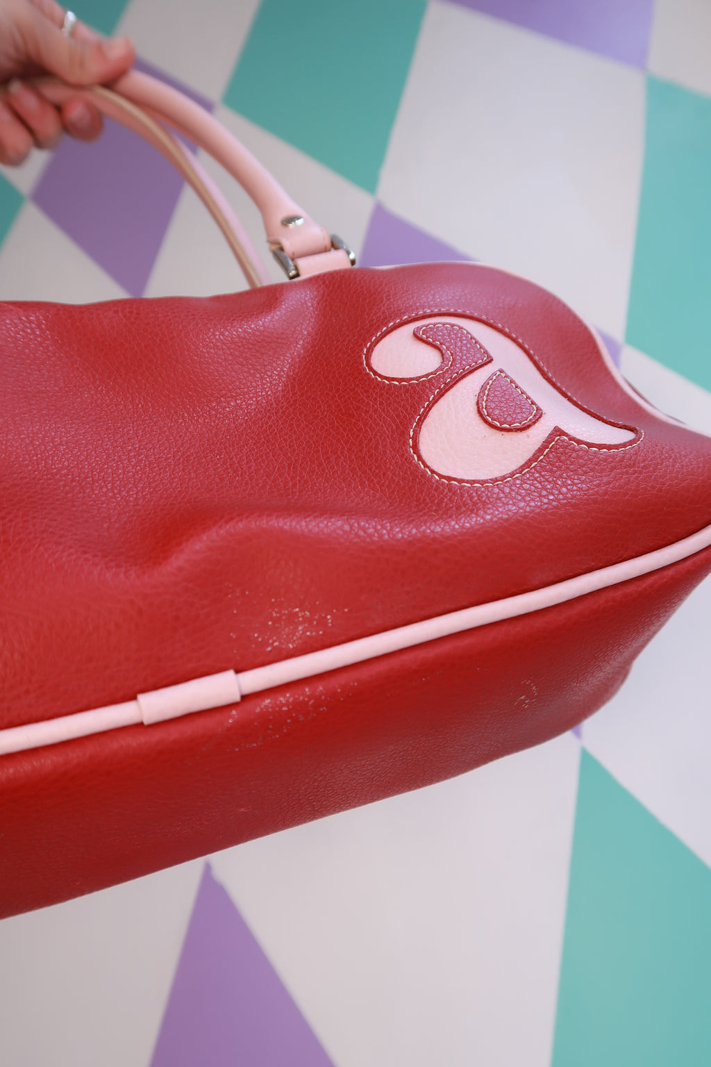 Vintage Y2K red mini bowling bag by Elektra Vintage with pink trim, stylish retro purse for casual and night-out looks.