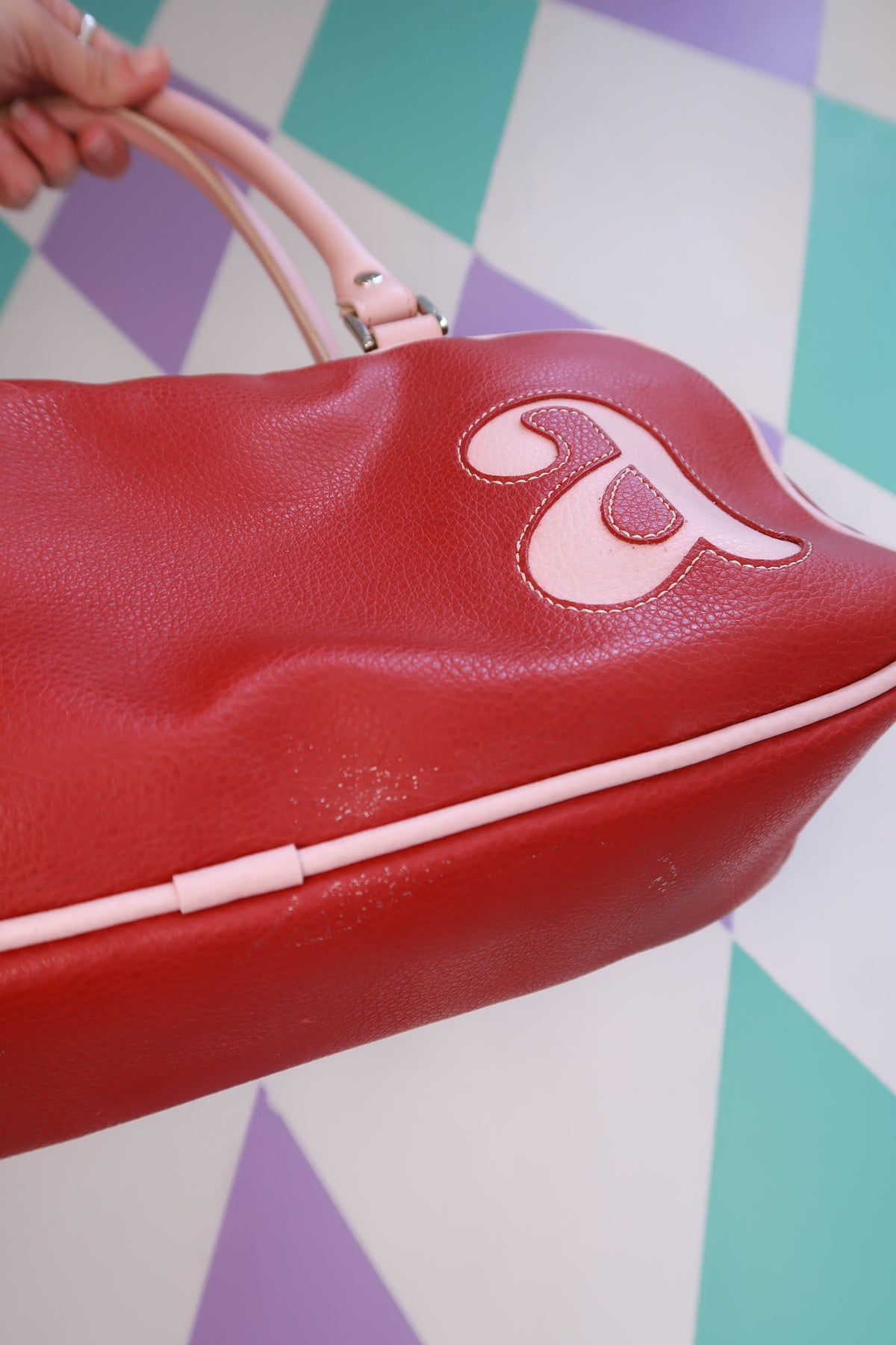 Vintage Y2K red mini bowling bag by Elektra Vintage with pink trim, stylish retro purse for casual and night-out looks.