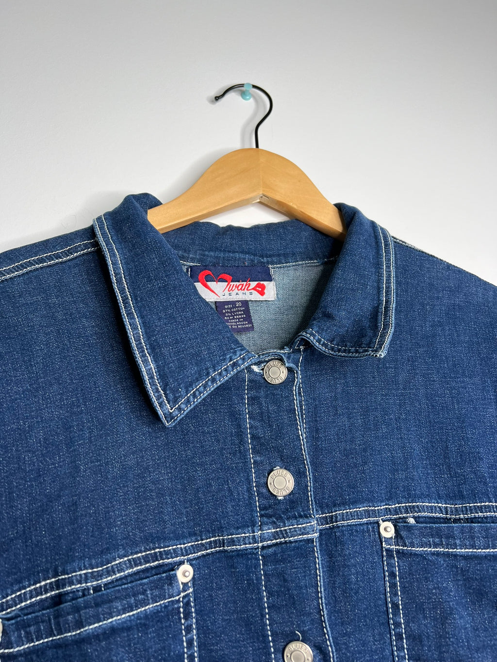 Women's 2000s vintage denim button-up shirt by Elektra Vintage, featuring classic denim fabric and button front design.
