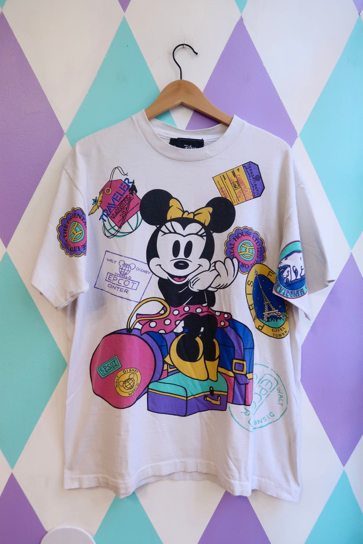 Vintage 90s Disney EPCOT Minnie Mouse graphic tee with all-over print design by Elektra Vintage.