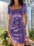 Purple sequin mini dress by Elektra Vintage, 80s-inspired vintage dress with shimmering sequins and fitted silhouette.