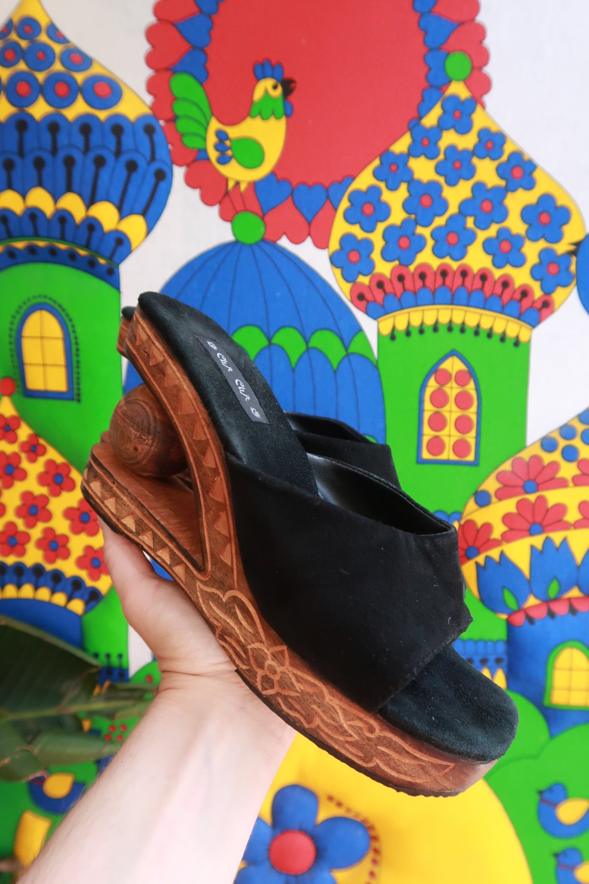 Elektra Vintage carved wooden platform wedge sandals with intricate designs and a natural wood finish, stylish and comfortable footwear.