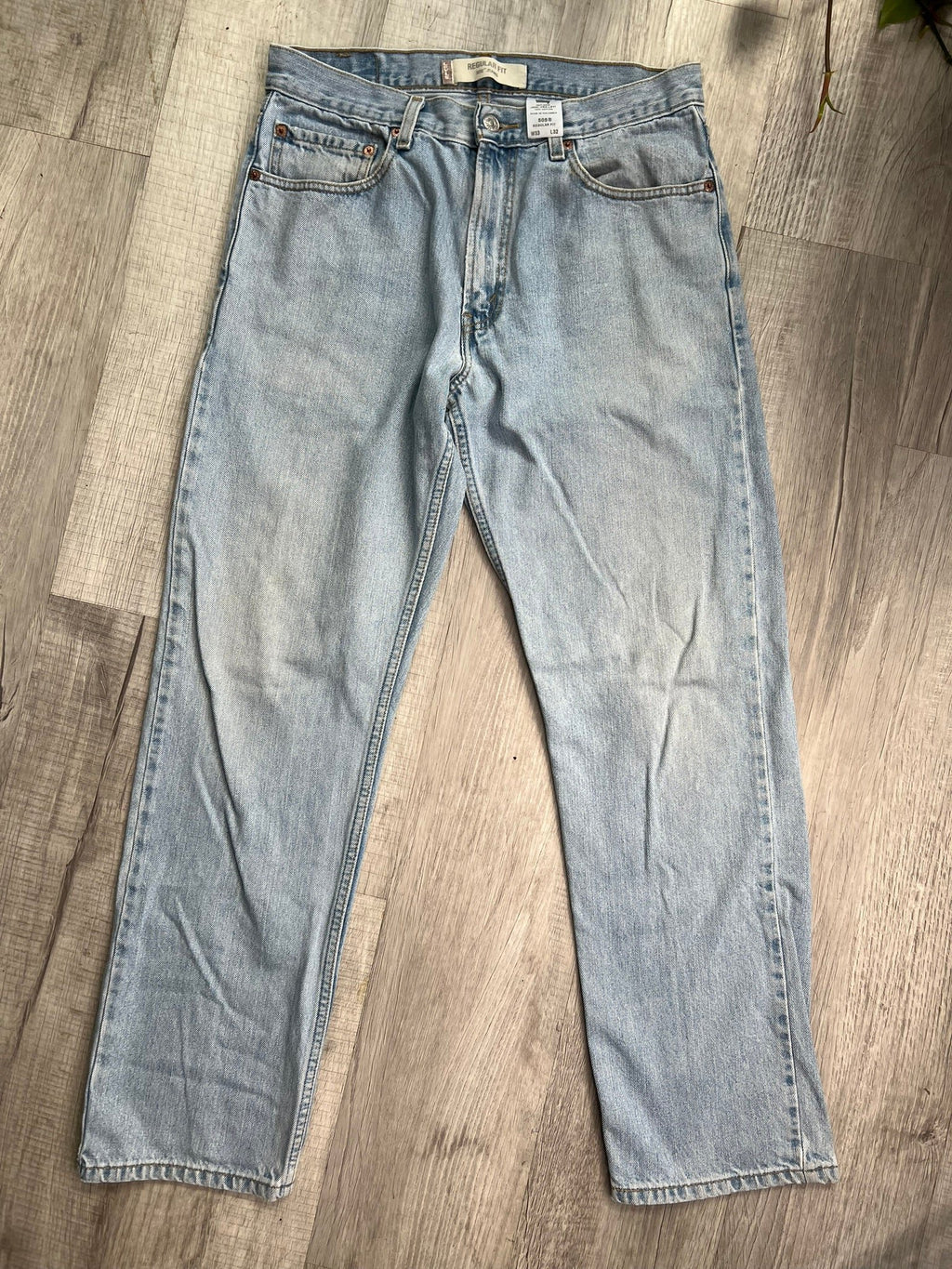 Men's Levi's Light Wash 505 Regular Fit Jeans from Elektra Vintage, showcasing classic denim with a relaxed fit and light wash finish.