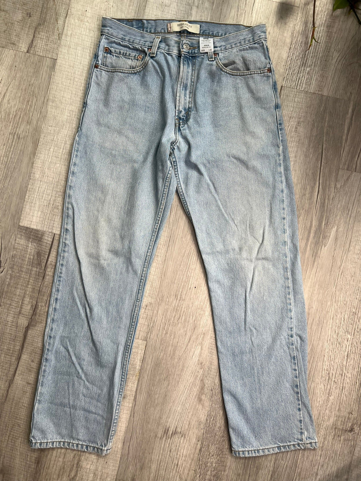 Men's Levi's Light Wash 505 Regular Fit Jeans from Elektra Vintage, showcasing classic denim with a relaxed fit and light wash finish.
