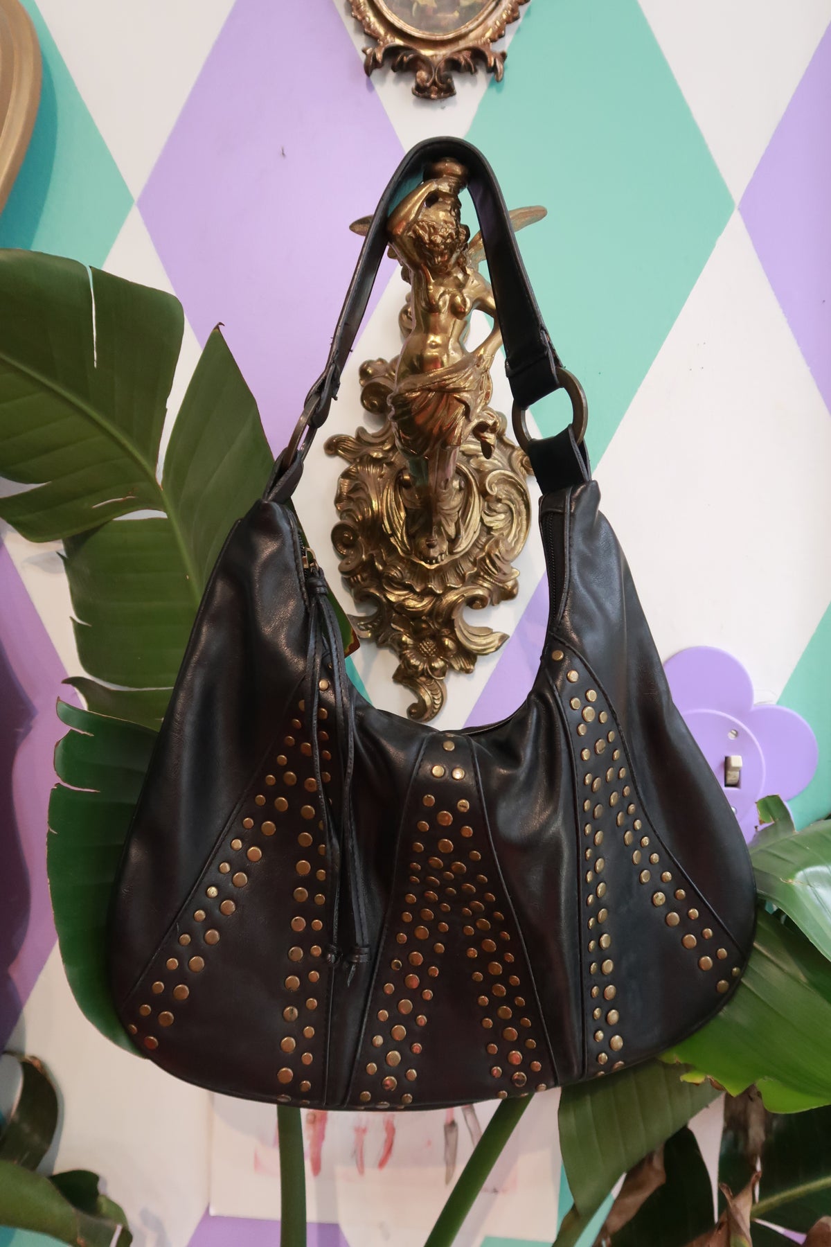 Elektra Vintage faux leather studded hobo shoulder bag with antique finish and adjustable strap, stylish and spacious for daily use.