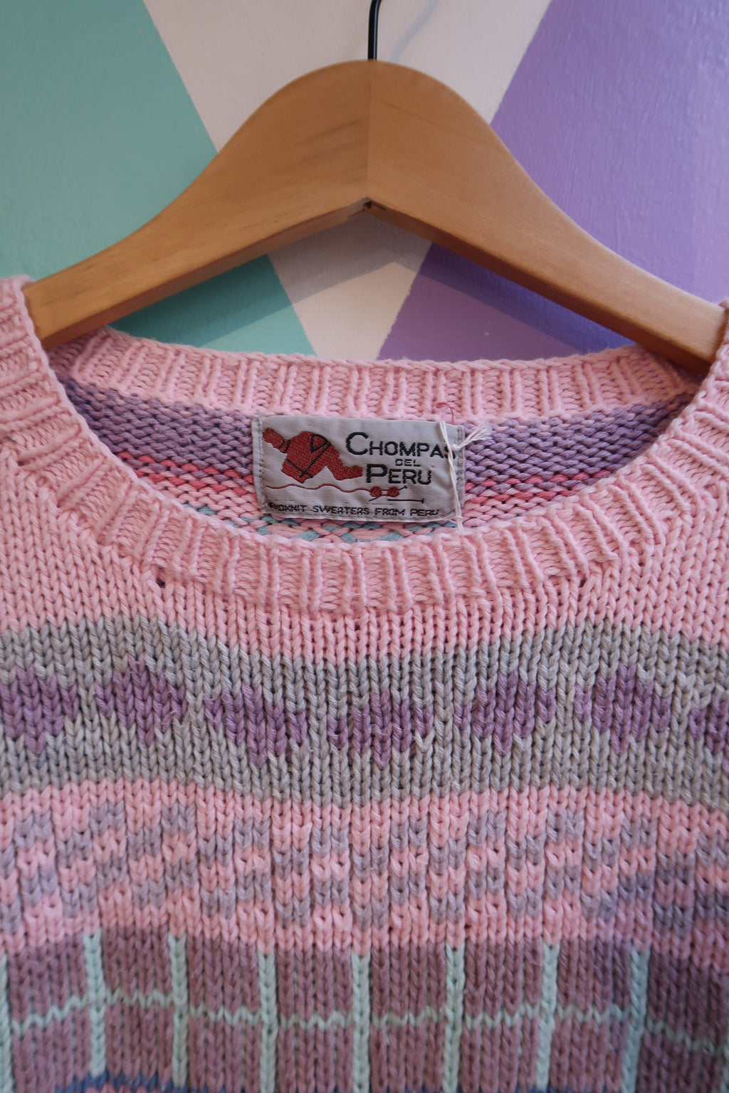 Pink Fair Isle sweater by Chompas Del Peru, featuring traditional knit pattern and cozy fit, styled by Elektra Vintage.