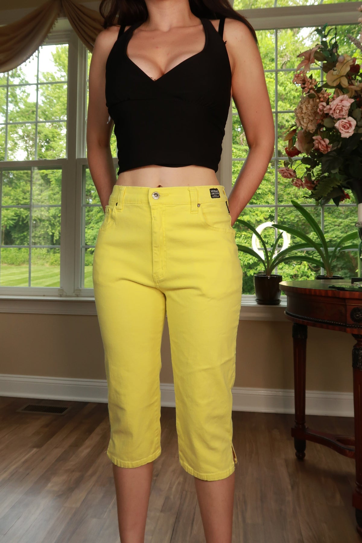Vintage 90s Versace Jeans Couture yellow women's Capri pants with a high waist and classic design, styled by Elektra Vintage.