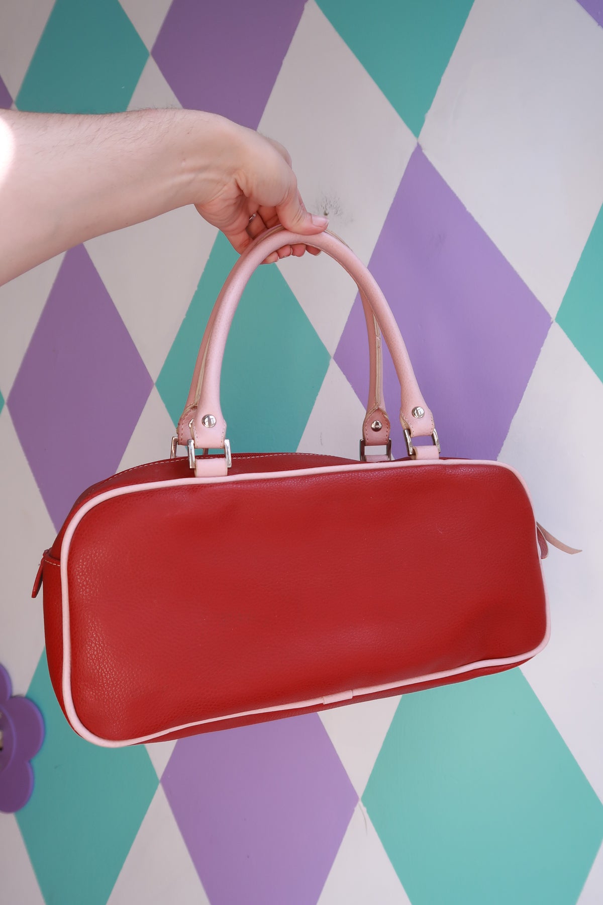 Vintage Y2K red mini bowling bag by Elektra Vintage with pink trim, featuring a compact purse design and retro style.